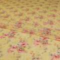 Sunflower yellow viscose fabric with hot pink, pale brown print having gold laminated stone work in floral design-D9262 Regal Fabrics