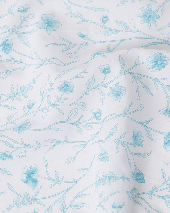 White cotton voile fabric with baby blue print in floral design-D15422