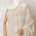 Light beige silk georgette kameez with multicolor embroidery, bead work and sequin work in floral design. Light beige plain salwar with same tone georgette dupatta having multicolor embroidery and stone work-D15523 Regal Fabrics