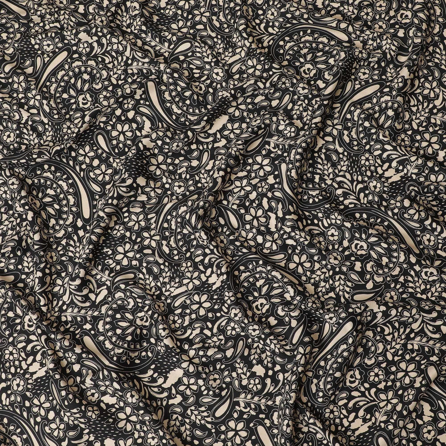 Black viscose twill printed fabric with beige prints in floral design-D11172