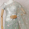 Mint green Premium net saree with same tone embroidery having baby pink sequin work and gold bead work in floral design-D15587