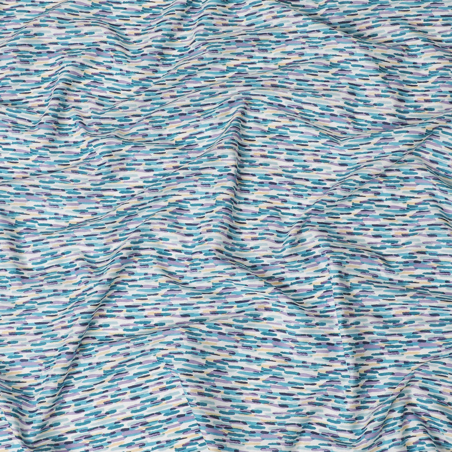 Off white cotton lawn fabric withbaby blue, lavender and navy blue print in fancy design-D15230