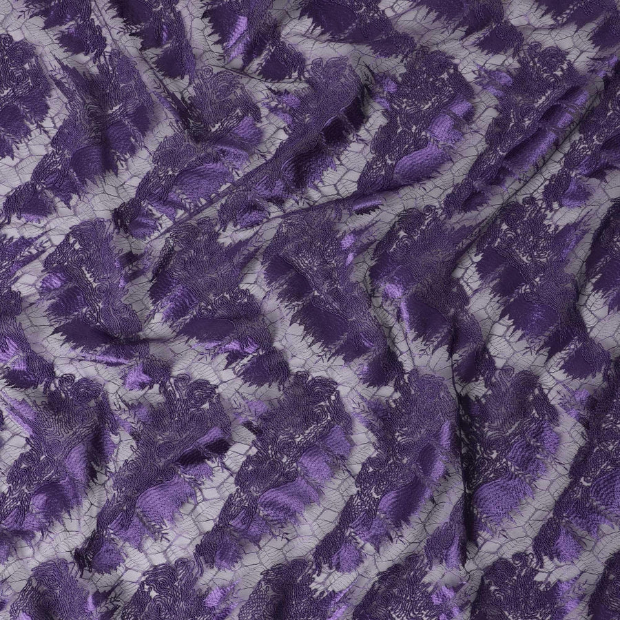 Purple nylon tulle fabric with same tone, lavender embroidery in fancy design