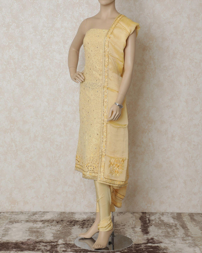 Blonde yellow georgette kameez with same tone embroidery having sequin, bead work and stone work in floral design. Blonde yellow plain salwar having silk organza dupatta with bead work and stone work-D12671
