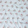 Powder blue premium pure cotton voile fabric with sage green, beige and crimson red embroidery in floral design-D13696