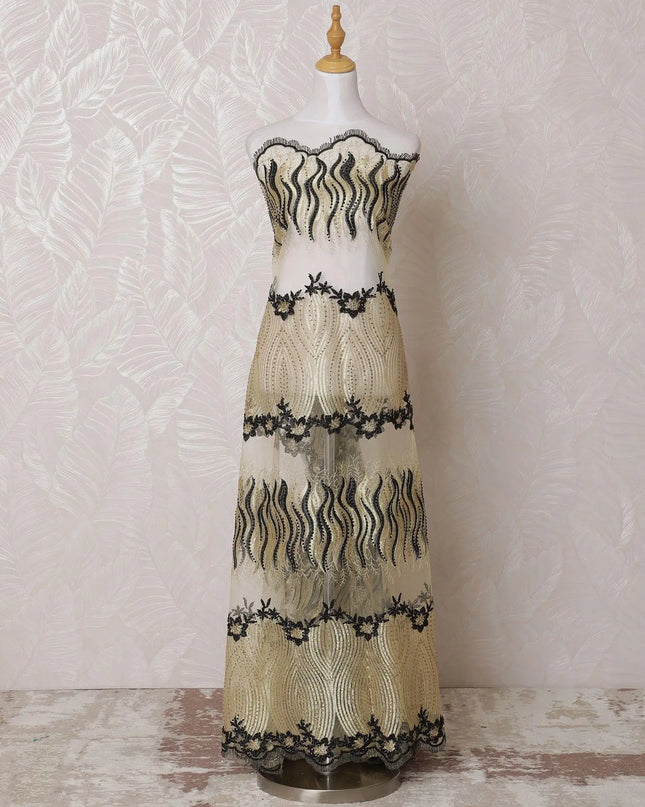 Gold nylon tulle fabric with same tone, black embroidery having stone work in fancy design-D14710 Regal Fabrics