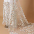 Off white Premium wedding nylon tulle fabric with powder blue, light pink embroidery, applique work, bead work , pearls and sequins in floral design-D7920