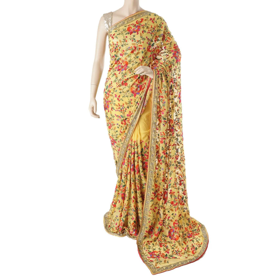 Light mustard yellow blended synthetic chiffon saree with multicolor embroidery in fancy design having multicolor bead work Regal Fabrics