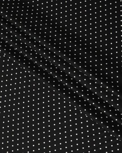 Black viscose crepe printed fabric with white prints in polka dot design-D11157