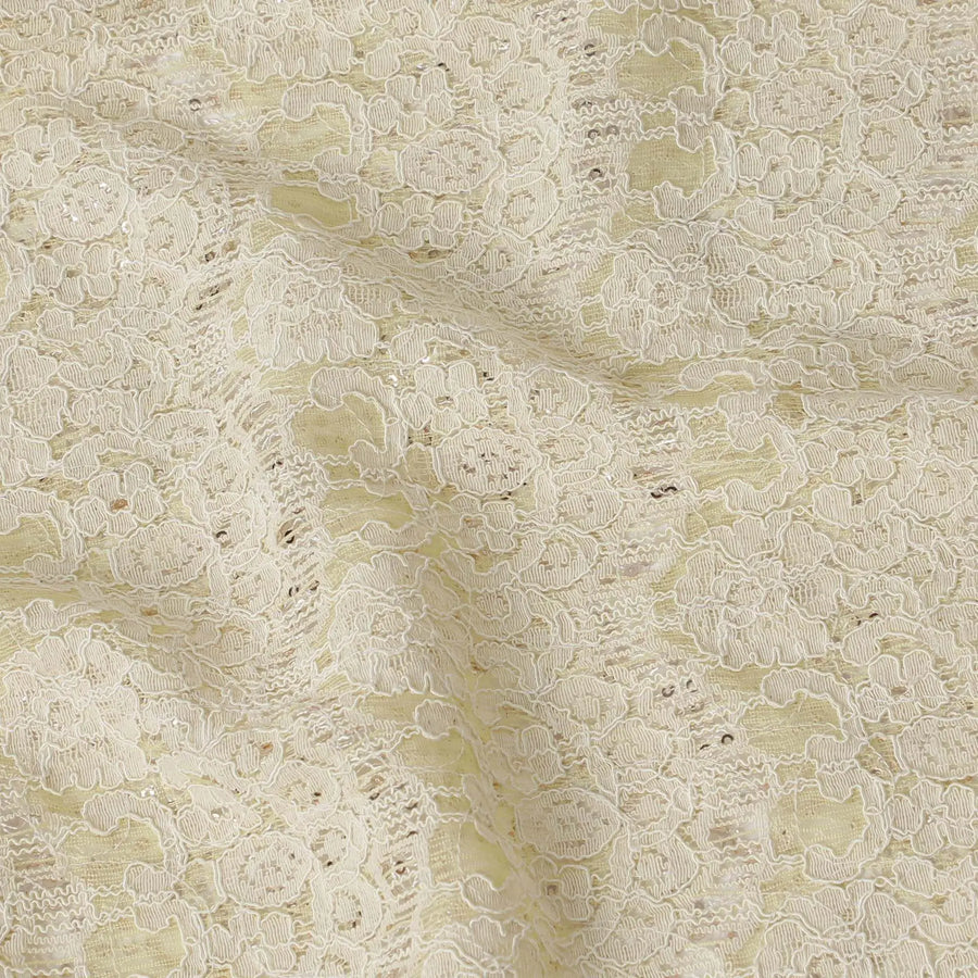 Yellow lace fabric with off white lace net and golden sequins in abstract design Regal Fabrics