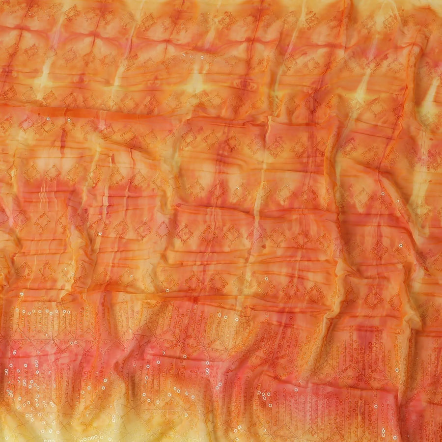 Tangerine orange & light yellow synthetic chiffon fabric with transparent sequins and embroidery in geometric design Regal Fabrics