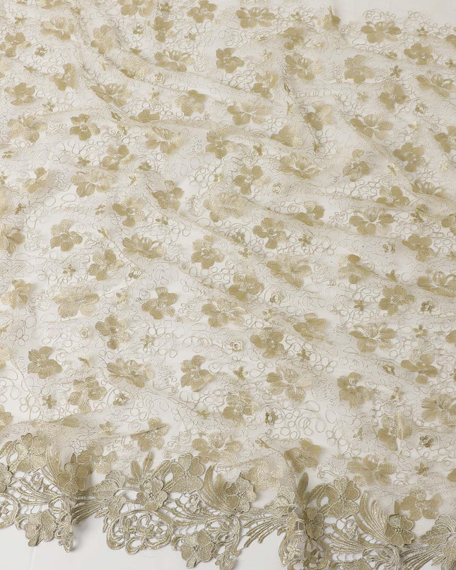 Honeysuckle beige nylon tulle fabric with gold floral embroidery and fancy border in floral design