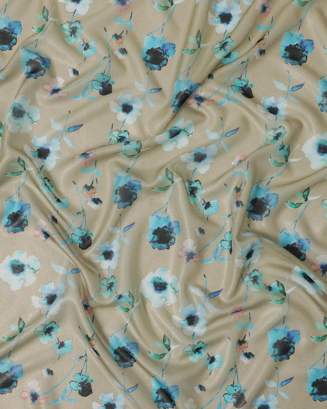 قماش من الشيفون الحريري باللون البيج اللاتيه مع طباعة باللون الأزرق الفيروزي والأسود وأزرق المايا بتصميم الأزهار