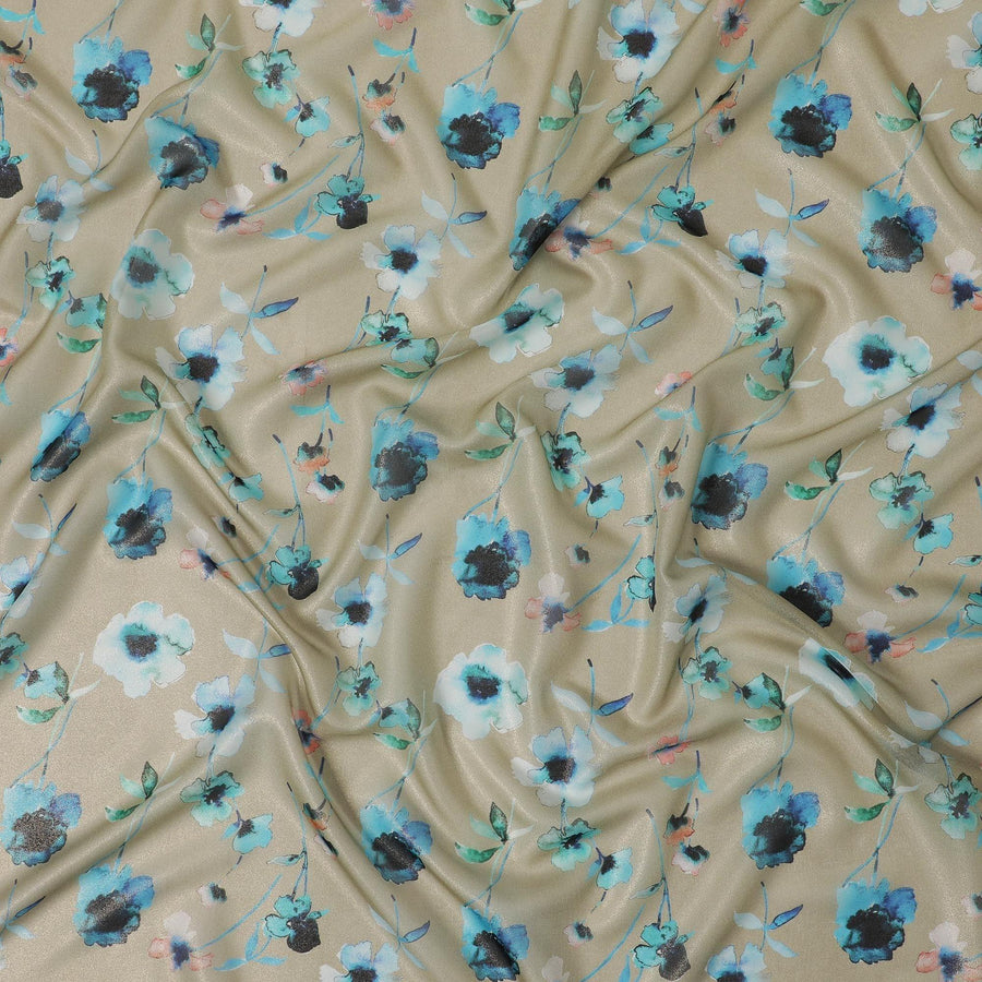 قماش من الشيفون الحريري باللون البيج اللاتيه مع طباعة باللون الأزرق الفيروزي والأسود وأزرق المايا بتصميم الأزهار
