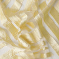 قماش تول نايلون ذهبي فاتح مع تطريز بنفس اللون بتصميم تجريدي
