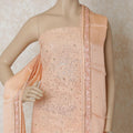 قميص جورجيت بلون الخوخ الفاتح مع تطريز بنفس اللون مع عمل الخرز والحجر والترتر بتصميم الأزهار. السلوار الخفيف ذو اللون الخوخي الخفيف الذي يحتوي على دوباتا الأورجانزا الحريرية بنفس اللون مع التطريز والخرز -D12670