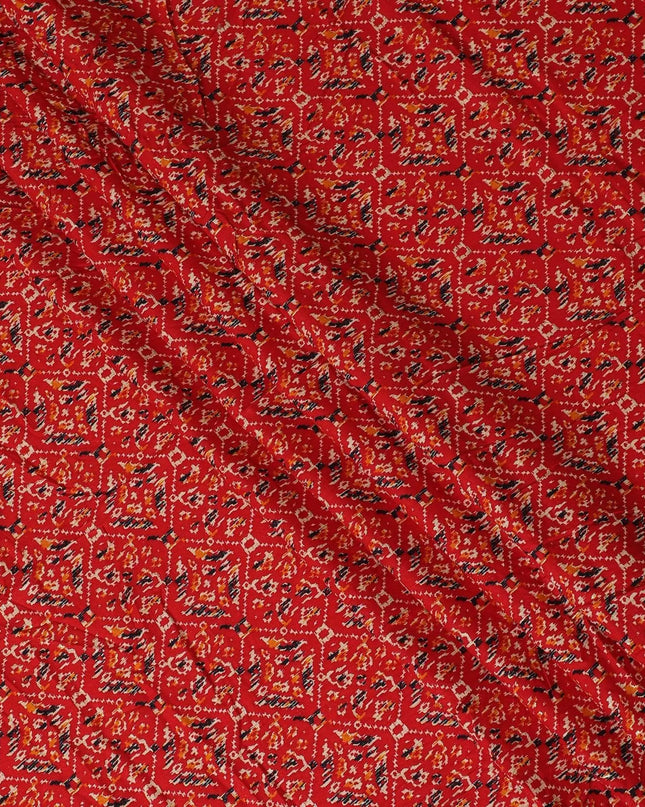 Crimson red cotton viscose fabric with black, orange and gold print in batik design-D14192 Regal Fabrics