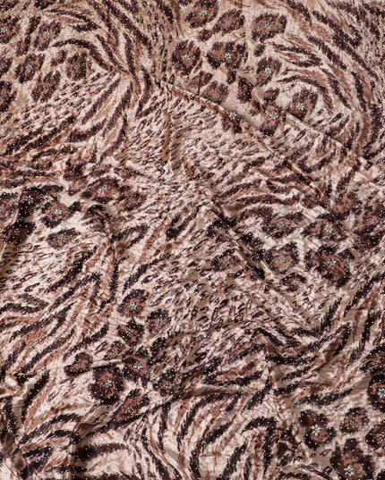 Light salmon pink Rayon velvet fabric with cocoa brown, fawn brown print having metallic silver studs in abstract design