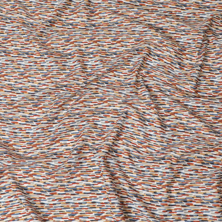 Off white cotton lawn fabric with blue, grey and red print in fancy design-D15227