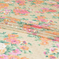 Light beige Swiss cotton voile fabric with sage green, baby pink and melon orange floral print having clip cord design-D6775