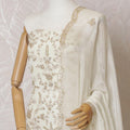 Cream Premium pure silk crepe kameez with gold embroidery, bead work, sequin work in floral design. Ceram Plain salwar with same tone chiffon dupatta having  gold embroidery and bead work-D15573