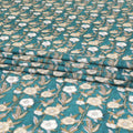 Sea green cotton lawn fabric with beige, black and off white print in floral design-D8439