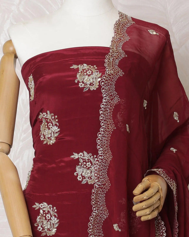 Ruby red silk crepe kameez with gold embroidery, sequins and bead work in floral design. Ruby red plain salwar with same tone flat chiffon dupatta having gold embroidery and mirror work-D15530 Regal Fabrics