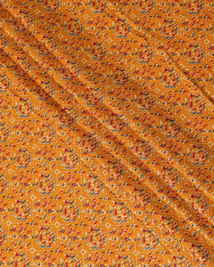 Mustard orange cotton viscose fabric with black, orange and gold print in batik design-D14195