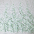 Mint green nylon tulle fabric with same tone embroidery having stone work in floral design-D11708