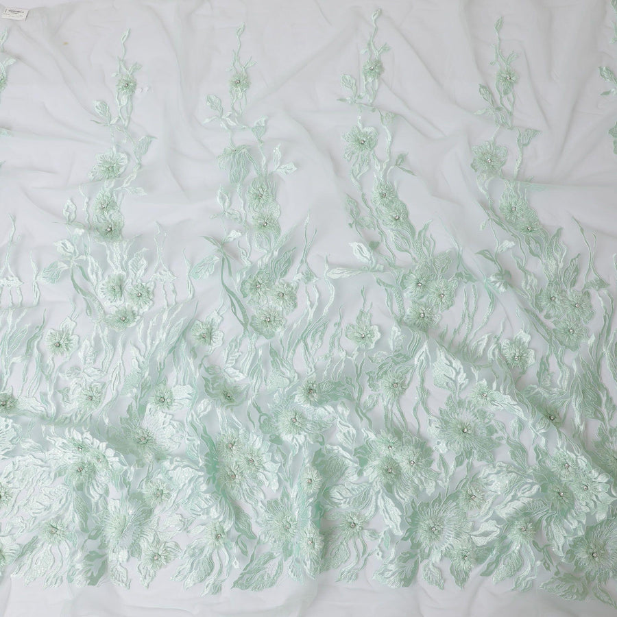 Mint green nylon tulle fabric with same tone embroidery having stone work in floral design-D11708