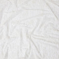 White nylon tulle fabric with same tone flock having glitter in fancy design-D13990 Regal Fabrics