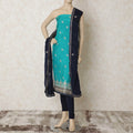 Turquoise blue silk kameez with gold embroidery having sequin work and bead work in floral design. Navy blue plain salwar having same tone chiffon dupatta with gold bead work-D12697 Regal Fabrics