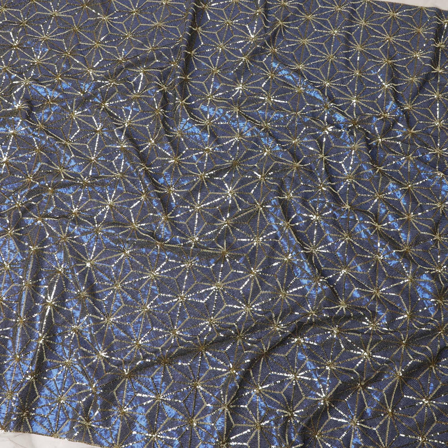 Beige nylon tulle fabric with azure blue and gold sequins in abstract design Regal Fabrics