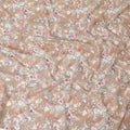 Light brown cotton voile fabric with off white, black, baby pink and beige print in floral design-D6281