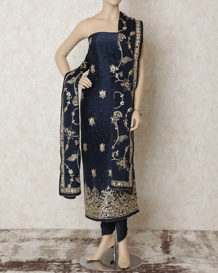 Navy blue silk kameez with gold embroidery having sequin work, gota work and bead work in floral design. Navy blue plain salwar with chiffon dupatta having gold embroidery-D12674