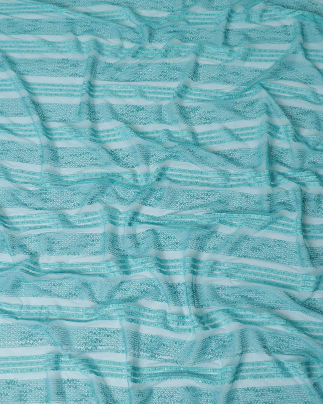 Turquoise blue nylon tulle fabric with same tone embroidery having sequins in fancy design-D11776 Regal Fabrics