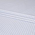 White blended Cotton shirting fabric with black, blue and baby blue print in stripe design-D6354