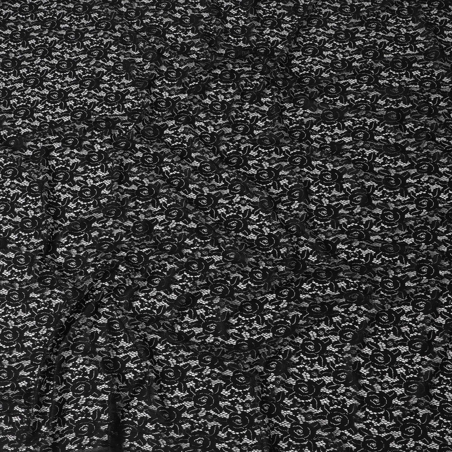 Black lace fabric with rose flowers in floral design