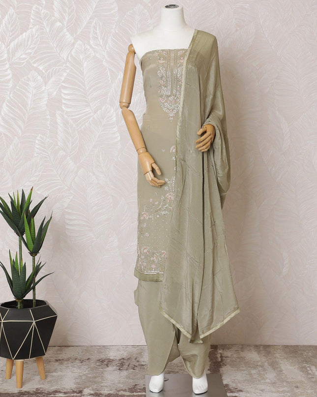 Artichoke green Premium pure silk crepe kameez with same tone embroidery, stone work and bead work in floral design. Artichoke green Plain salwar with same tone chiffon dupatta having same tone embroidery and stone work-D15570