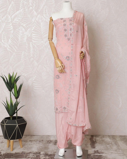 Salmon pink silk crepe kameez with same tone, moss green embroidery, bead work and sequin work in floral design. Salmon pink plain salwar with chiffon dupatta having with same tone embroidery and bead work-D15532