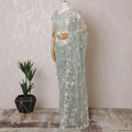 Mint green Premium net saree with same tone embroidery having baby pink sequin work and gold bead work in floral design-D15587