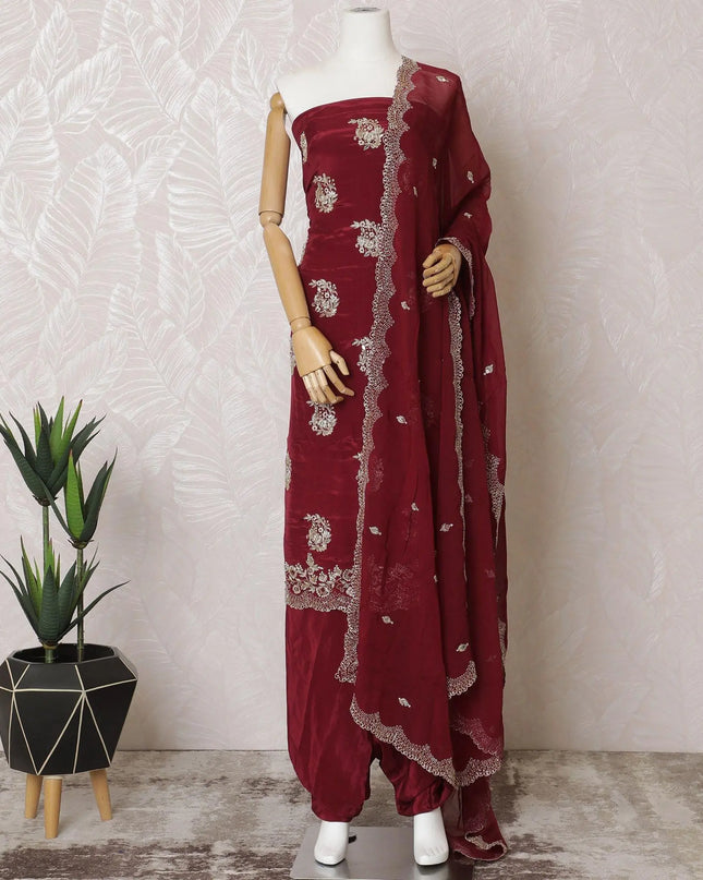 Ruby red silk crepe kameez with gold embroidery, sequins and bead work in floral design. Ruby red plain salwar with same tone flat chiffon dupatta having gold embroidery and mirror work-D15530 Regal Fabrics