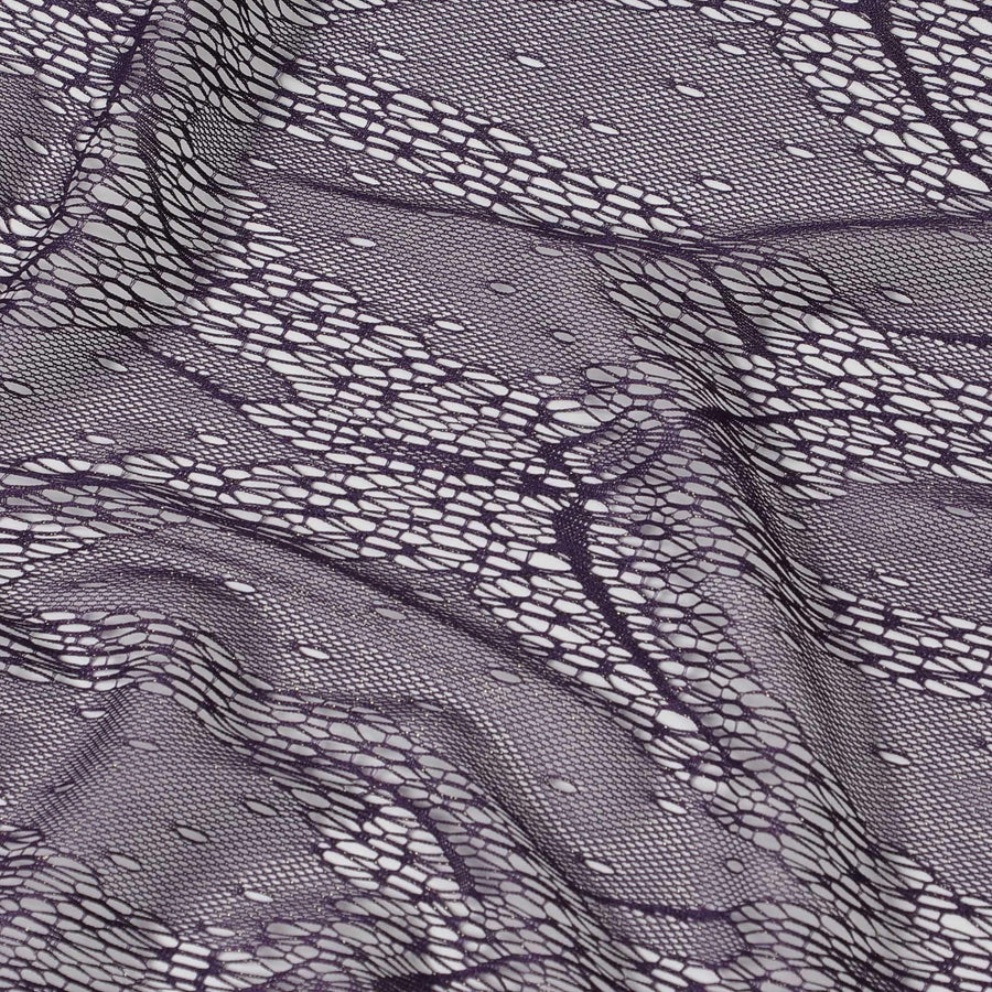 Dark Irish purple and gold metallic lace fabric in abstract design