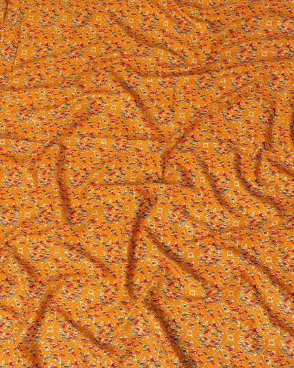 Mustard orange cotton viscose fabric with black, orange and gold print in batik design-D14195