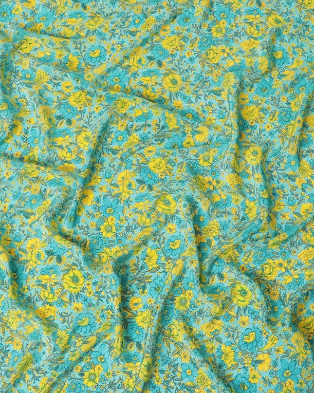 Turquoise blue silk crepe fabric with yellow, green and blye prints in floral design - D9911 Regal Fabrics