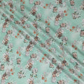 Turquoise green synthetic crepe fabric with multicolor print having stone work in floral design-D15313 - Regal Fabrics