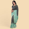 Navy blue to turquoise green imitation silk saree with gold metallic jacquard in floral design-D12785