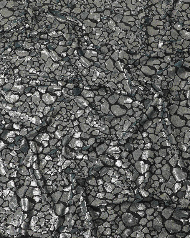 Black nylon tulle fabric with rainbow color sequins in abstract design