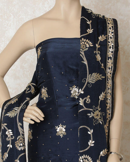 Navy blue silk kameez with gold embroidery having sequin work, gota work and bead work in floral design. Navy blue plain salwar with chiffon dupatta having gold embroidery-D12674