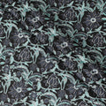 Black organic cotton fabric with stone grey, vista green and off white screen block print in floral design-D10283
